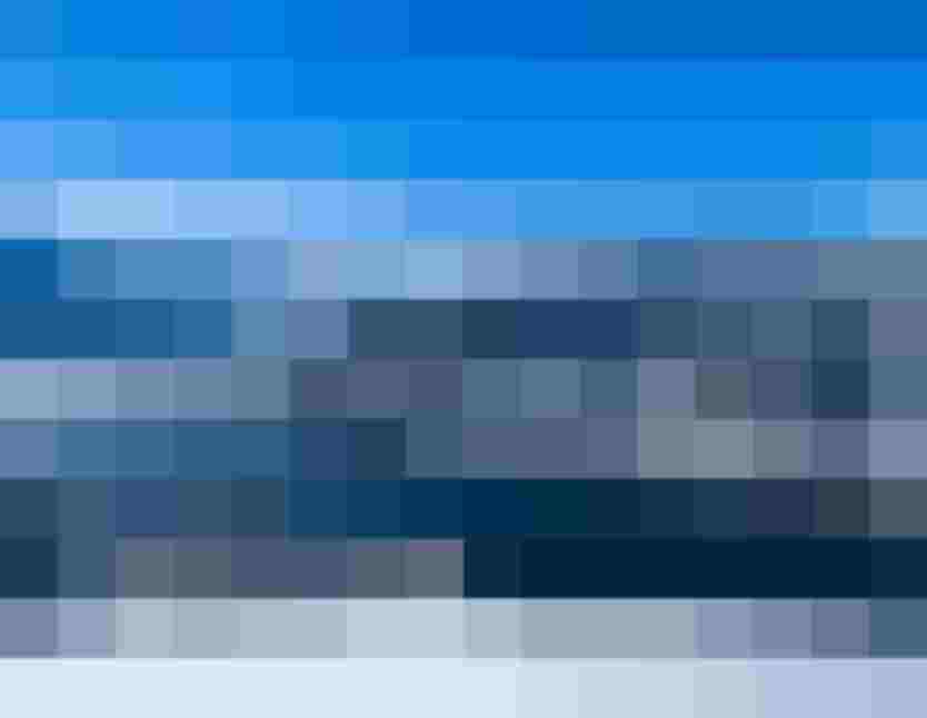 Winter Landscape with Snow-Covered Mountains and Lake Zell in the Kaprun Region.