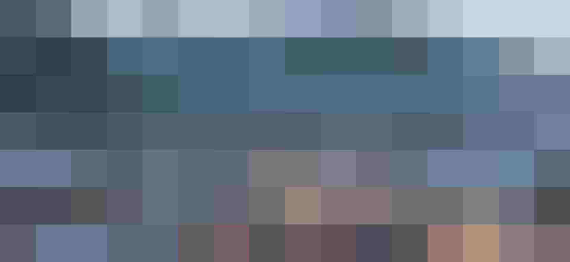 Winter View of Kaprun with Illuminated Streets and Snow-Covered Mountains.